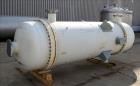 Unused- Perry Products Single Pass Shell & Tube Heat Exchanger, 4,143 Square Feet, Model FTS-48-4143, Vertical. Carbon steel shell rated 183 psi/Full Vacuum at -20 to 300 degrees F. (2110) 3/4