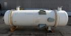 Unused- Perry Products Single Pass Shell & Tube Heat Exchanger, 4,143 Square Feet, Model FTS-48-4143, Vertical. Carbon steel shell rated 183 psi/Full Vacuum at -20 to 300 degrees F. (2110) 3/4