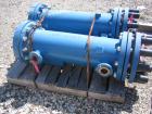 Used SGL Carbon Group Cylindrical Block Graphite Heat Exchanger. Approximately 25 square feet, vertical, model CK2. Service and process sides each rated 100 psi at 356 deg F. Openings: shell (2) 2
