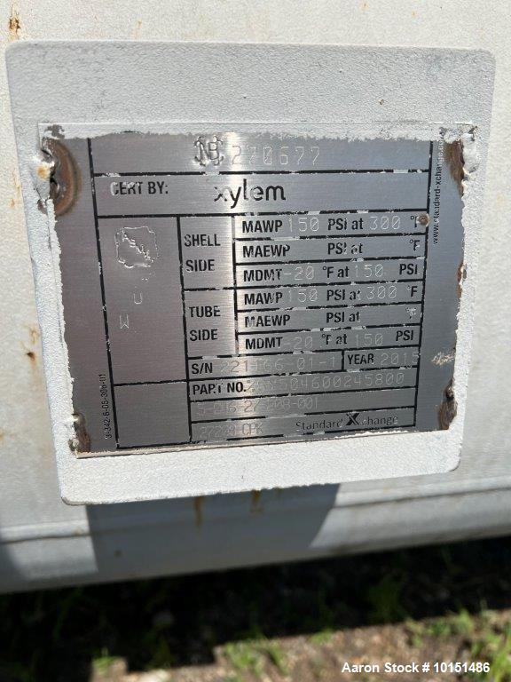 Used Xylem, Inc. Approximately 1,540 Square Foot Shell/Tube Heat Exchanger. 1,540 square feet surface area; National Board # 270677; Serial: 221166-01-1; 150 psi @ 300F shell MAWP; 150 psi @ 300F tub...