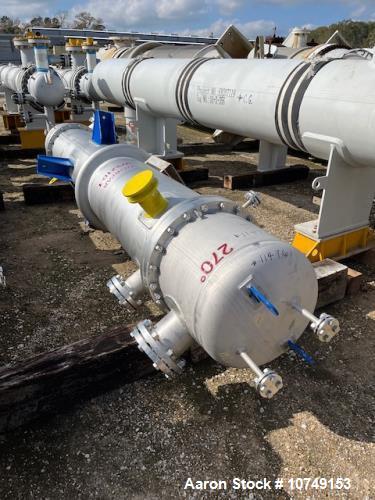 Unused- 650 sq. ft. vertical heat exchanger. Mfg. by Wuxi Zhicherg Biochemical Eng. in 2021. 1.8 Design duty (MMBTU/Hr). Shell Design Rating: 147/FV psig @ 428 deg. F. Tube Design Rating: 174/FV psig...