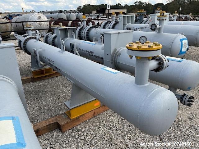 Used Wuxi Chemical Equipment Horizontal 333 sq. ft. Shell and Tube Heat Exchanger. Duplex 2205 stainless steel tubes rated 288.3 psi at 32 to 330 degrees F, 16' 7'' tube length. Duplex 2205 shell rat...