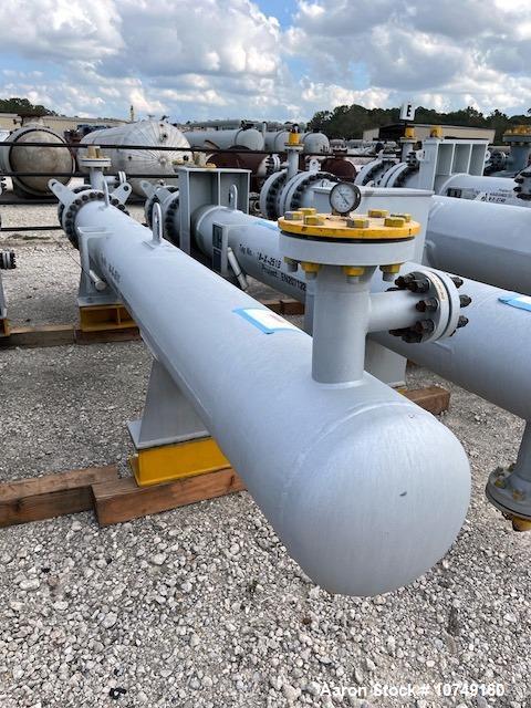 Used Wuxi Chemical Equipment Horizontal 333 sq. ft. Shell and Tube Heat Exchanger. Duplex 2205 stainless steel tubes rated 288.3 psi at 32 to 330 degrees F, 16' 7'' tube length. Duplex 2205 shell rat...