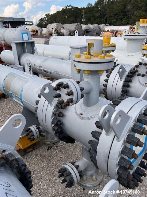 Used Wuxi Chemical Equipment Horizontal 333 sq. ft. Shell and Tube Heat Exchanger. Duplex 2205 stainless steel tubes rated 288.3 psi at 32 to 330 degrees F, 16' 7'' tube length. Duplex 2205 shell rat...