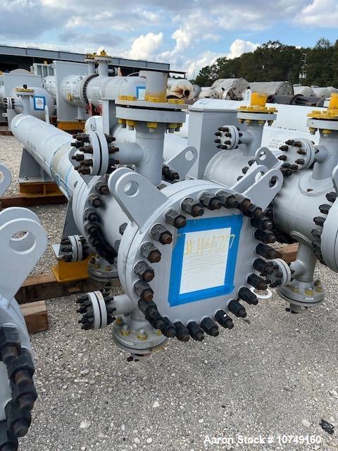 Used Wuxi Chemical Equipment Horizontal 333 sq. ft. Shell and Tube Heat Exchanger. Duplex 2205 stainless steel tubes rated 288.3 psi at 32 to 330 degrees F, 16' 7'' tube length. Duplex 2205 shell rat...