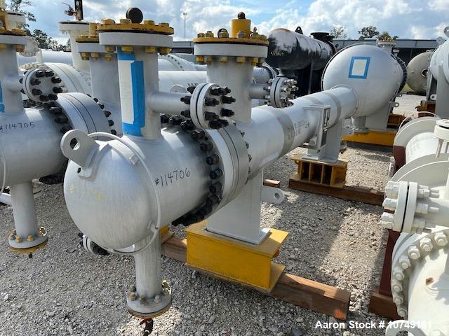 Used Wuxi Chemical Equipment 272 Square Foot Horizontal Shell and Tube Heat Exchanger. Duplex 2205 stainless steel tubes rated 532 psi at 32 to 430 degrees F, 10' 6'' Tube length. Carbon steel head. ...