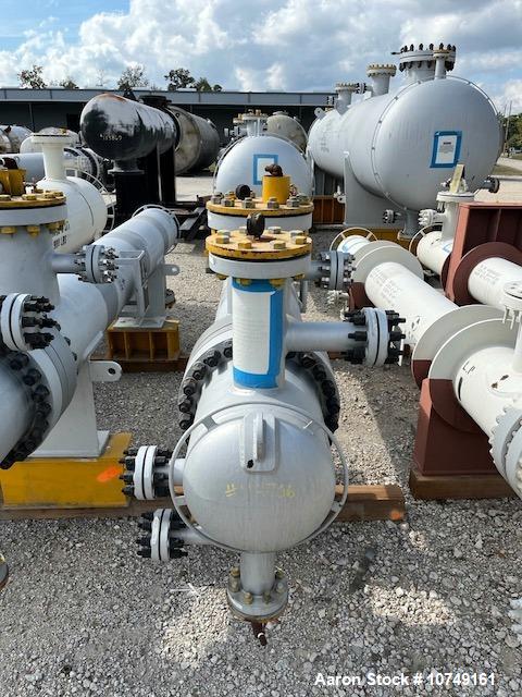 Used Wuxi Chemical Equipment 272 Square Foot Horizontal Shell and Tube Heat Exchanger. Duplex 2205 stainless steel tubes rated 532 psi at 32 to 430 degrees F, 10' 6'' Tube length. Carbon steel head. ...