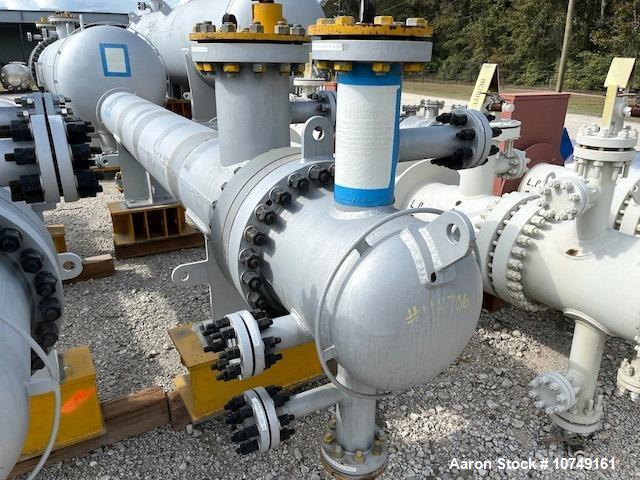 Used Wuxi Chemical Equipment 272 Square Foot Horizontal Shell and Tube Heat Exchanger. Duplex 2205 stainless steel tubes rated 532 psi at 32 to 430 degrees F, 10' 6'' Tube length. Carbon steel head. ...