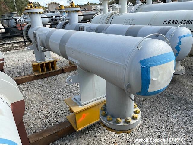 Used Wuxi Chemical Equipment 272 Square Foot Horizontal Shell and Tube Heat Exchanger. Duplex 2205 stainless steel tubes rated 532 psi at 32 to 430 degrees F, 10' 6'' Tube length. Carbon steel head. ...