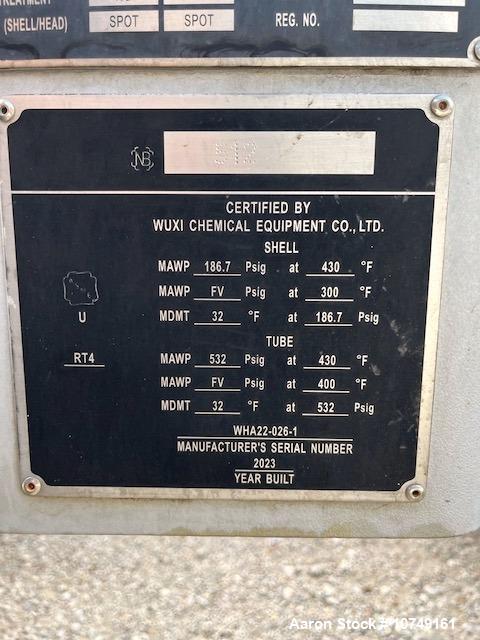Used Wuxi Chemical Equipment 272 Square Foot Horizontal Shell and Tube Heat Exchanger. Duplex 2205 stainless steel tubes rated 532 psi at 32 to 430 degrees F, 10' 6'' Tube length. Carbon steel head. ...
