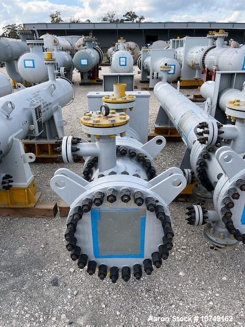 Used Wuxi Chemical Equipment 333 Square Foot Horizontal Shell and Tube Heat Exchanger. Duplex 2205 stainless steel tubes rated 288.3 psi at 32 to 330 degrees F, 16' 7'' Tube length. Carbon steel head...