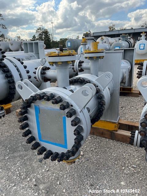 Used Wuxi Chemical Equipment 333 Square Foot Horizontal Shell and Tube Heat Exchanger. Duplex 2205 stainless steel tubes rated 288.3 psi at 32 to 330 degrees F, 16' 7'' Tube length. Carbon steel head...