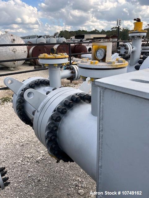 Used Wuxi Chemical Equipment 333 Square Foot Horizontal Shell and Tube Heat Exchanger. Duplex 2205 stainless steel tubes rated 288.3 psi at 32 to 330 degrees F, 16' 7'' Tube length. Carbon steel head...