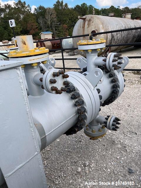 Used Wuxi Chemical Equipment 333 Square Foot Horizontal Shell and Tube Heat Exchanger. Duplex 2205 stainless steel tubes rated 288.3 psi at 32 to 330 degrees F, 16' 7'' Tube length. Carbon steel head...