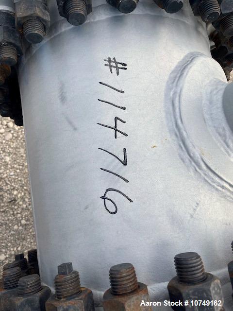 Used Wuxi Chemical Equipment 333 Square Foot Horizontal Shell and Tube Heat Exchanger. Duplex 2205 stainless steel tubes rated 288.3 psi at 32 to 330 degrees F, 16' 7'' Tube length. Carbon steel head...