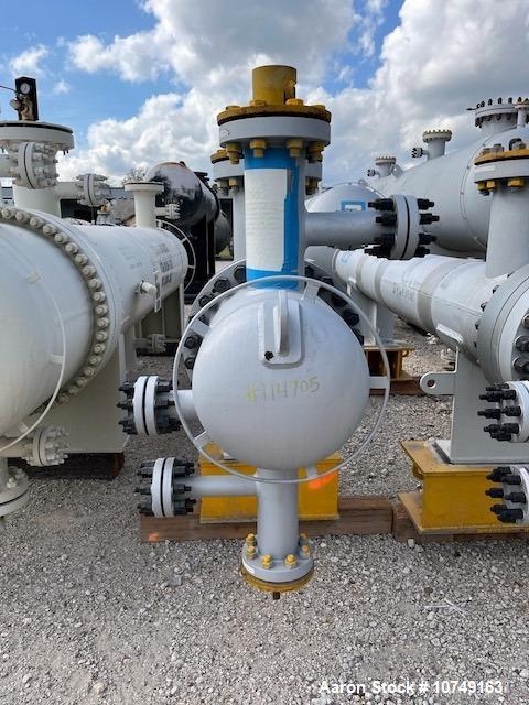 Used Wuxi Chemical Equipment Horizontal 234 Square Foot Shell and Tube Heat Exchanger. Duplex 2205 stainless steel tubes rated 532 psi at 32 to 430 degrees F, 9' Tube length, 130 tube holes. Carbon s...