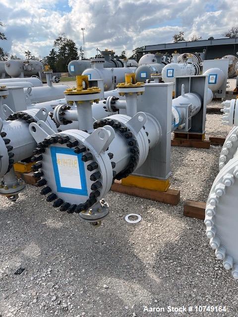 Used Wuxi Chemical Equipment 333 Square Foot Shell and Tube Heat Exchanger, Horizontal. Duplex 2205 stainless steel tubes rated 288.3 psi at 32 to 330 degrees F, 16' 7'' Tube length. 15'' Shell diame...