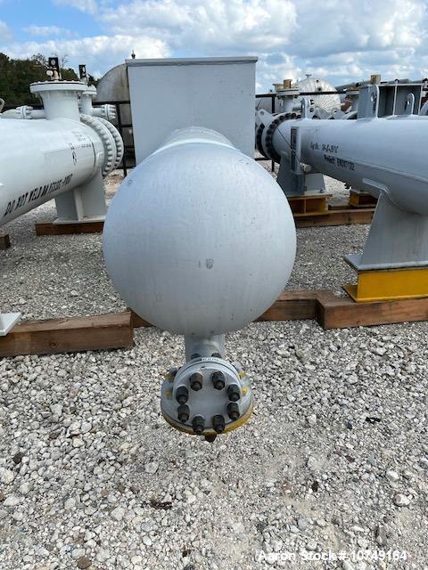 Used Wuxi Chemical Equipment 333 Square Foot Shell and Tube Heat Exchanger, Horizontal. Duplex 2205 stainless steel tubes rated 288.3 psi at 32 to 330 degrees F, 16' 7'' Tube length. 15'' Shell diame...