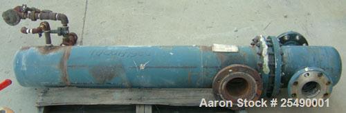 Used ITT Standard 2 Pass U Tube Heat Exchanger, 32 square feet, model 08048, type B-300S, horizontal. Carbon steel shell rated 150 psi at 375 deg.f., (22) 3/4" diameter x 4' long 316 stainless steel ...