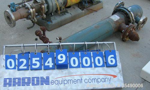 Used ITT Standard 2 Pass U Tube Heat Exchanger, 32 square feet, model 08048, type B-300S, horizontal. Carbon steel shell rated 150 psi at 375 deg.f., (22) 3/4" diameter x 4' long 316 stainless steel ...