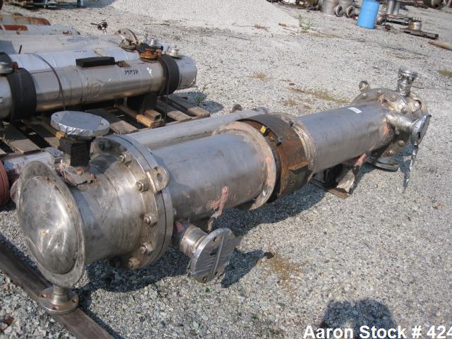 Used Atlas Heat shell and tube exchanger, 237 square feet. 316L stainless steel tubes, tube sheets, shell and bonnets, with (151) .75" x 8' long tubes, rated 100 psi and full vacuum at 300 f tube sid...