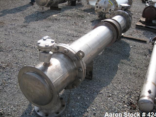 Used Atlas Heat shell and tube exchanger, 237 square feet. 316L stainless steel tubes, tube sheets, shell and bonnets, with (151) .75" x 8' long tubes, rated 100 psi and full vacuum at 300 f tube sid...