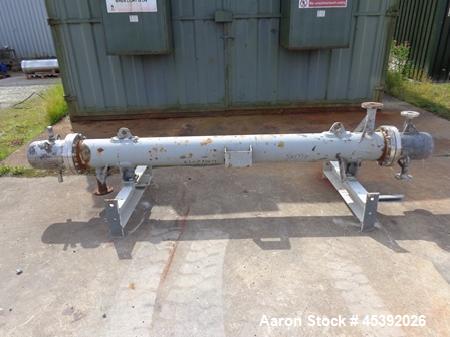 Used Shell & Tube Heat Exchanger, Approximate 48 Square Feet (4.5 Square Meter). Stainless steel shell approximate 240mm diameter x 2430mm long rated 10.6 bar. (30) 20mm Diameter x 2430mm long stainl...