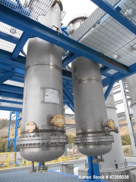 Unused- Shell and Tube Heat Exchanger, 265 Square Foot, Vertical. 304L Stainless steel shell rated 150 psi/FV at -30 to 300 degrees F. (76) 1-1/2" Diameter x 10' long 304L stainless steel tubes rated...