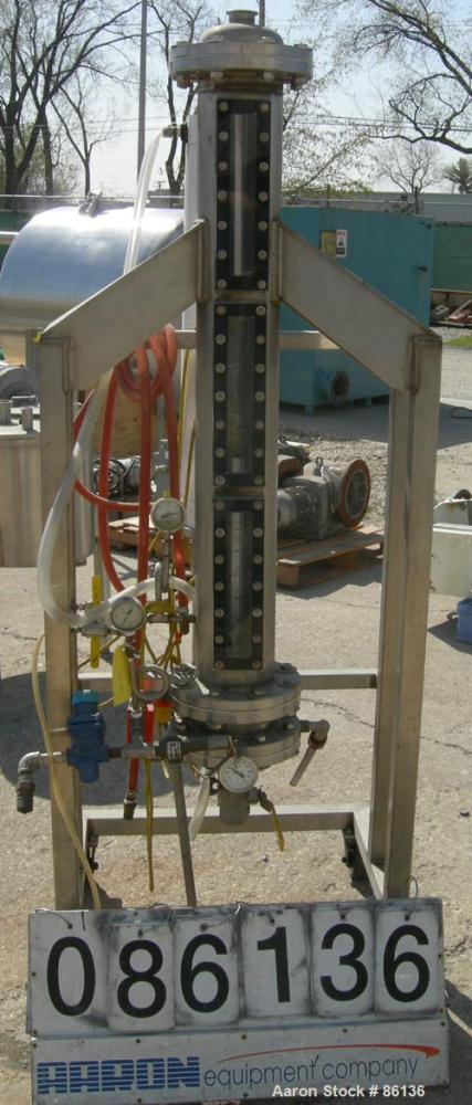 USED: Heat exchanger, approximately 31 square feet, 316 stainless steel, vertical. (88) 3/8" diameter x 3' long tubes. Includes (1) approximate 6" diameter x 4' long vertical column with side sight g...