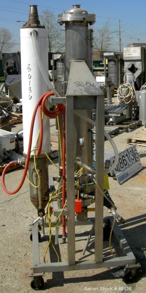 USED: Heat exchanger, approximately 31 square feet, 316 stainless steel, vertical. (88) 3/8" diameter x 3' long tubes. Includes (1) approximate 6" diameter x 4' long vertical column with side sight g...