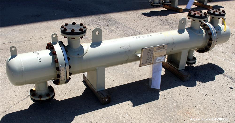 Unused- AT&F Advanced Metals Single Pass Shell and Tube Heat Exchanger, 76.2 Square Feet, Horizontal. Carbon steel shell rated 195 psi at -20 to 400 degrees F. (67) 3/4" Diameter x 72" long 2205 stai...