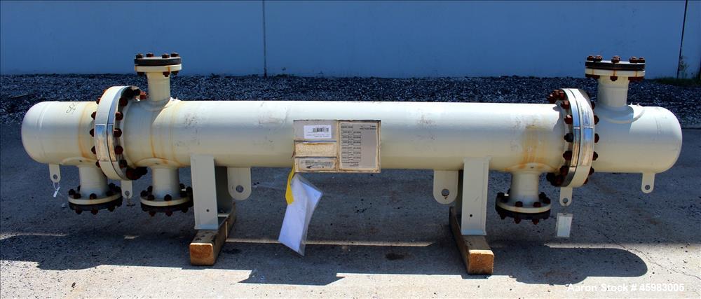 Unused- AT&F Advanced Metals Single Pass Shell and Tube Heat Exchanger, 76.2 Square Feet, Horizontal. Carbon steel shell rated 195 psi at -20 to 400 degrees F. (67) 3/4" Diameter x 72" long 2205 stai...