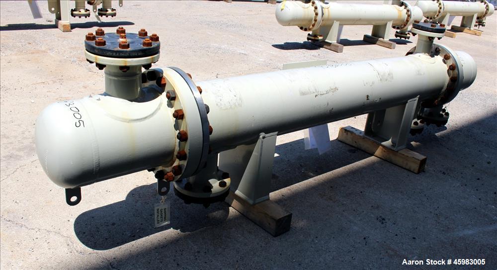Unused- AT&F Advanced Metals Single Pass Shell and Tube Heat Exchanger, 76.2 Square Feet, Horizontal. Carbon steel shell rated 195 psi at -20 to 400 degrees F. (67) 3/4" Diameter x 72" long 2205 stai...