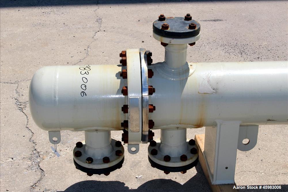 Unused- AT&F Advanced Metals Single Pass Shell and Tube Heat Exchanger, 76.2 Square Feet, Horizontal. Carbon steel shell rated 195 psi at -20 to 400 degrees F. (67) 3/4" Diameter x 72" long 2205 stai...