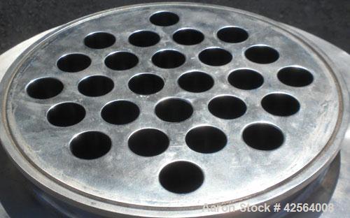 Used Allegheny Bradford Shell and Tube Heat Exchanger, 20 square feet, 316 stainless steel, vertical. (26) 7/8" Diameter x 39-1/2" long tubes. 5/8" Inlet/outlet shell. No heads. Mounted on 3 stainles...
