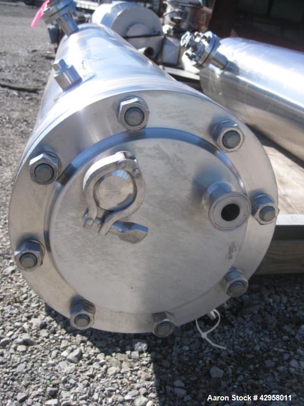 Used Allegny Bradford shell and tube heat exchanger, 20 sq ft U tube, 316L stainless steel tubes, tube sheet and bonnet (56) 3/8" diameter x 4' long tubes rated 150 psi at 350 f, 304L stainless steel...