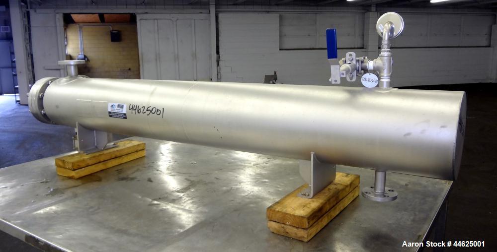Used Allegheny Bradford U Tube Heat Exchanger, approximately 35 square feet, horizontal. 304 Stainless steel shell rated 150 psi at 20 to 350 degrees F, (50) 3/8" diameter x 72" long 316 stainless st...