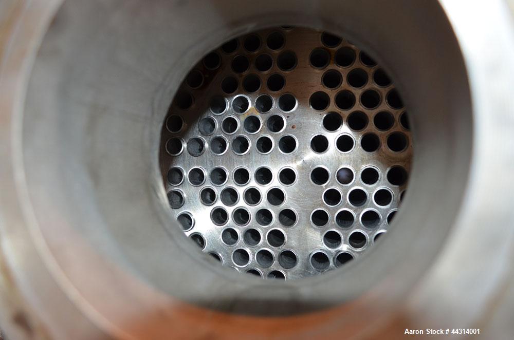 Used Ametek Single Pass Shell & Tube Heat Exchanger, 123 Square Feet, Horizontal. Size 10-A-72, Type AHT-1-A-SS. 316 Stainless steel shell rated 150 psi at 400 degrees F. (112) 5/8” Diameter x 72” lo...