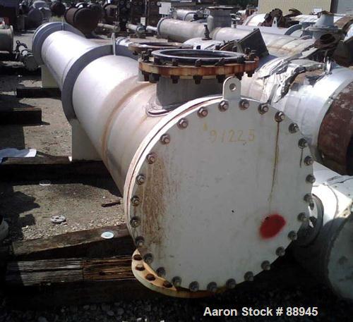 USED: Arjay Industries Ltwo pass shell and tube heat exchanger, 2777 square feet, horizontal. 304L stainless steel shell rated 150 psi at 200 deg F, (408) 1" diameter x 25' long 304L stainless steel ...