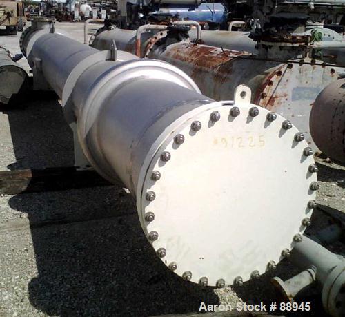 USED: Arjay Industries Ltwo pass shell and tube heat exchanger, 2777 square feet, horizontal. 304L stainless steel shell rated 150 psi at 200 deg F, (408) 1" diameter x 25' long 304L stainless steel ...