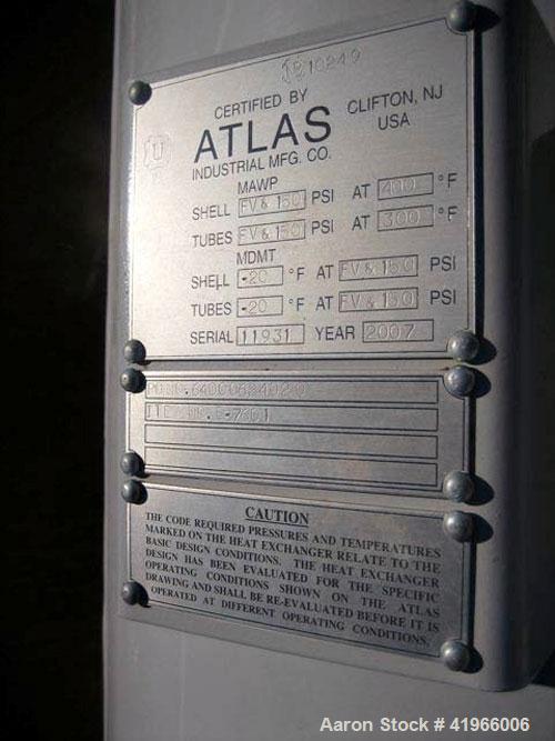 Unused- Atlas Industrial 4 Pass Shell and Tube Heat Exchanger, 1471 square feet, horizontal, type BEM 30-168. Carbon steel shell rated FV/150 psi at -20 to 400 deg F. (408) 1" diameter x 14’ long 304...