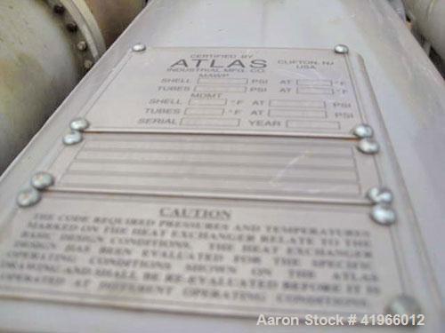 Unused- Atlas Industrial 8 Pass Shell and Tube Heat Exchanger, 2199 square feet, horizontal, type BEM 36-264. Carbon steel shell rated FV/150 psi at -20 to 400 deg F. (309) 1-1/4'' diameter x 22’ lon...