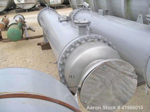 Unused- Atlas Industrial Single Pass Shell and Tube Heat Exchanger, 843 square feet, horizontal, type BEM 24-144. Carbon steel shell rated FV/150 psi at -20 to 400 deg F. (273) 1" diameter x 12’ long...