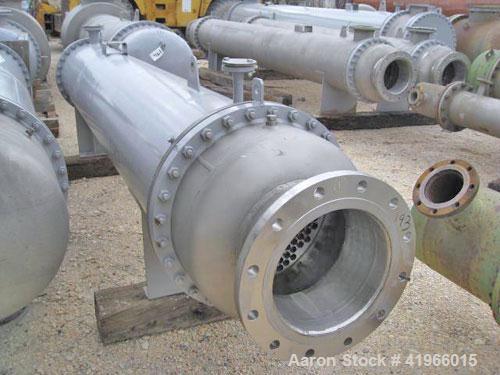 Unused- Atlas Industrial Single Pass Shell and Tube Heat Exchanger, 843 square feet, horizontal, type BEM 24-144. Carbon steel shell rated FV/150 psi at -20 to 400 deg F. (273) 1" diameter x 12’ long...