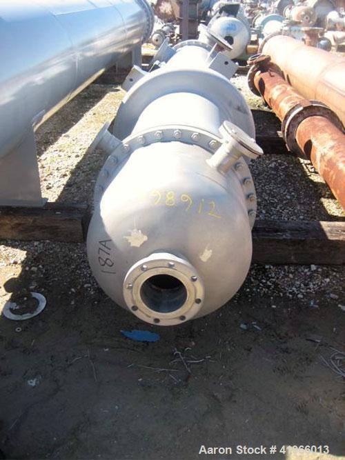 Unused- Atlas Industrial Single Pass Shell and Tube Heat Exchanger, 1274 square feet, vertical, type BEM 26-144. Carbon steel shell rated FV/150 psi at -20 to 400 deg F. (552) 3/4" diameter x 12’ lon...