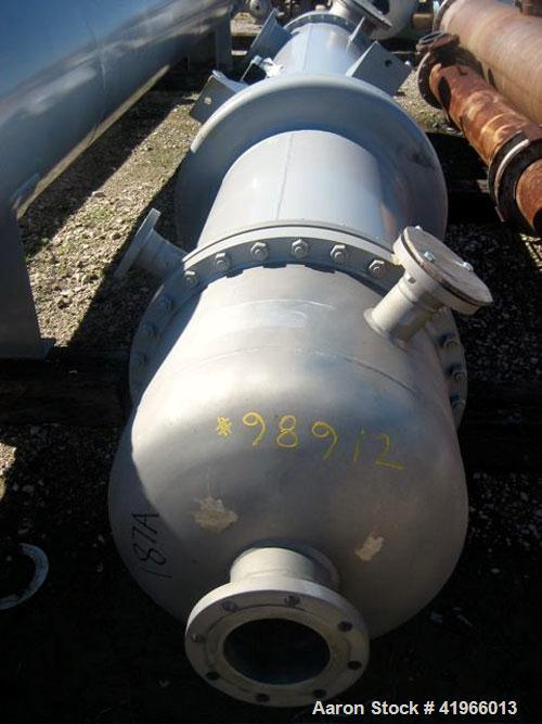 Unused- Atlas Industrial Single Pass Shell and Tube Heat Exchanger, 1274 square feet, vertical, type BEM 26-144. Carbon steel shell rated FV/150 psi at -20 to 400 deg F. (552) 3/4" diameter x 12’ lon...