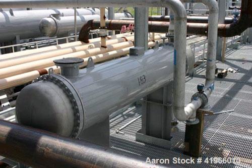 Unused- Atlas Industrial 4 Pass Shell And Tube Heat Exchanger, 1180 Square Feet, Horizontal. Type BEM 28-120. Carbon steel shell rated FV/150 psi at -20 to 400 deg.f.. (615) 3/4" diameter x 10’ long ...