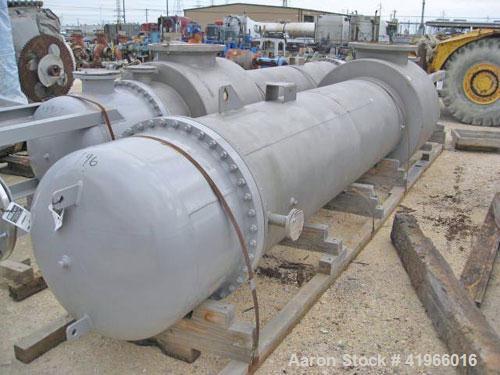 Unused- Atlas Industrial 4 Pass Shell and Tube Heat Exchanger, 3487 square feet, vertica, type BEM 36-192. 304 Stainless steel shell rated FV/75 psi at -20 to 300 deg F. (1127) 3/4" diameter x 16’ lo...