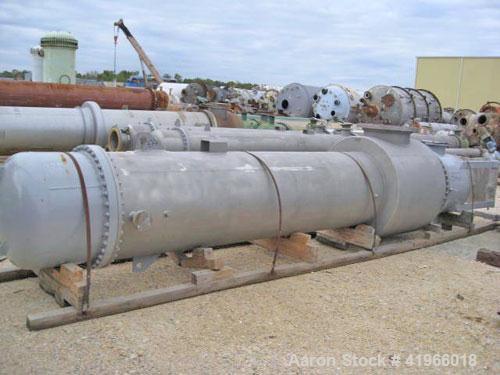 Unused- Atlas Industrial 4 Pass Shell and Tube Heat Exchanger, 3487 square feet, vertical, type BEM 36-192. 304 Stainless steel shell rated FV/75 psi at -20 to 300 deg F. (1127) 3/4'' diameter x 16’ ...