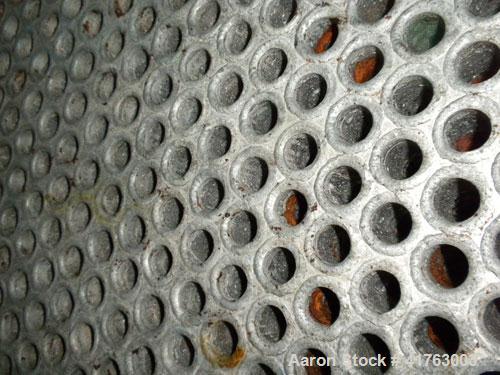 Used Atlas Industrial Shell and Tube Heat Exchanger, 686 square feet, horizontal. Tema type BEM 21-120. Carbon steel shell rated 150 psi at 450 deg F and –20 deg F at 150 psi. (350) 3/4" diameter x 1...